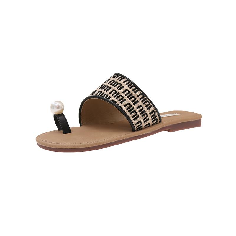 

Fairy wind flat-bottomed set of toe pearl slippers female 2025 summer Korean version new one-word comfortable outer wear cool slippers female 35 чёрный