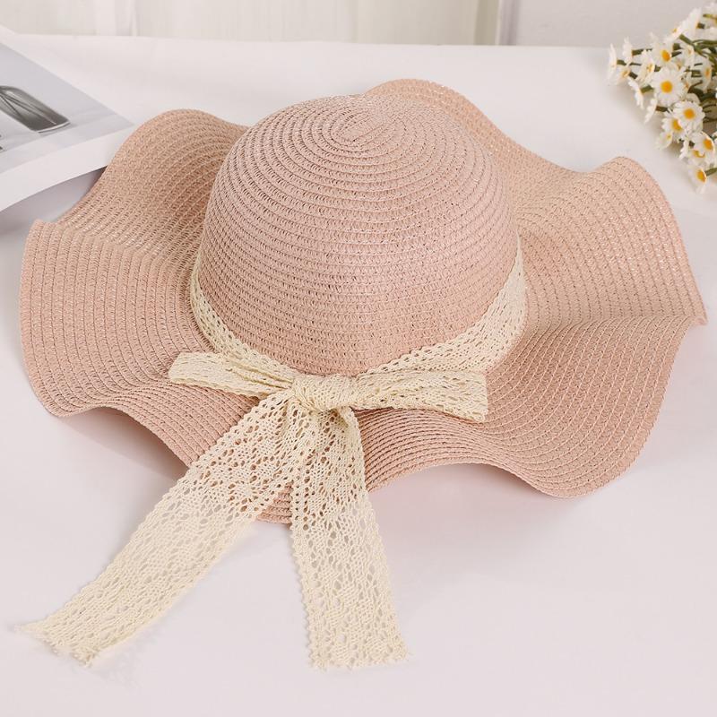 Summer wavy edge bow streamer straw hat seaside outing idyllic sunshade sun protection UV protection sun hat
