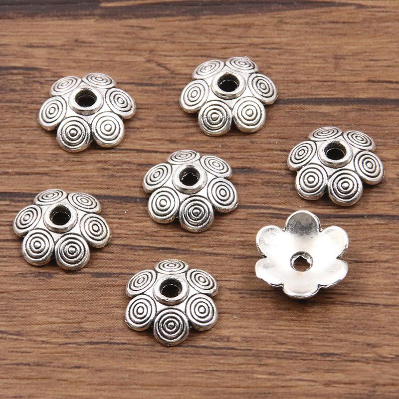 

Антикварные серебряные разделительные бусины в виде цветков: Многостильный, полый дизайн для браслетов и ожерелий DIY