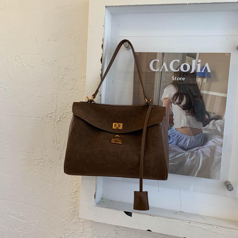 

Замшевая сумка женская 2025 новая ретро текстура нишевая ленивый ветер портативная сумка-тоут для компьютера портфель