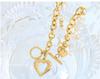 Marka 18k Gold Heart Necklace: French Style, Hollow Design, OT Clasp, Women's Titanium Steel Clavicle Chain (P1045)