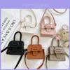 Chic Children's Mini Saddle Handbag Featuring Litchi Texture And Modern Style