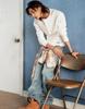 Guess Hyunjin's denim jeans and tapioca bag