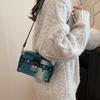 Damentasche 2025 neu europäische und amerikanische Mode Niet Umhängetasche ins Nischendesign vielseitige Messenger Box Bag
