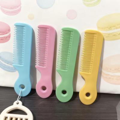 Adorable Mini Children's Comb with Round Teeth for Hair Care - Girlish Heart Design, Portable Hairdressing Comb for Kids.