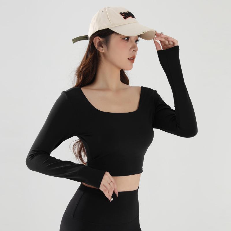 

Женский приталенный топ для йоги с длинным рукавом и встроенным бюстгальтером Extra Large чёрный