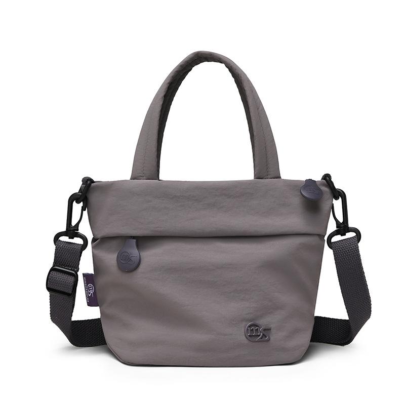 

Compact Crossbody Bag with Fold-Over Top and Adjustable Strap for Daily Use and Casual Outings темно-фиолетового
