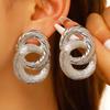 Fashionable Geometric Twisted and Round Gold Statement Earrings for Women… More