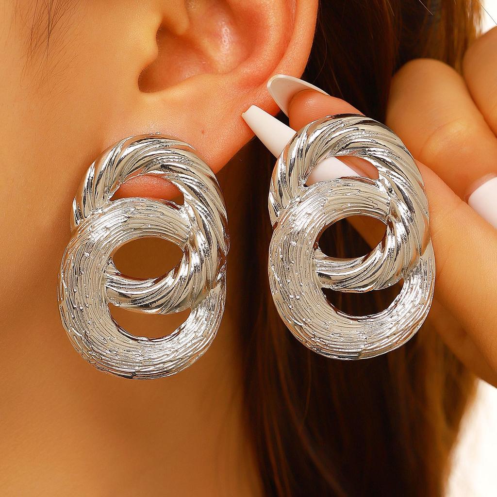 Fashionable Geometric Twisted and Round Gold Statement Earrings for Women… More