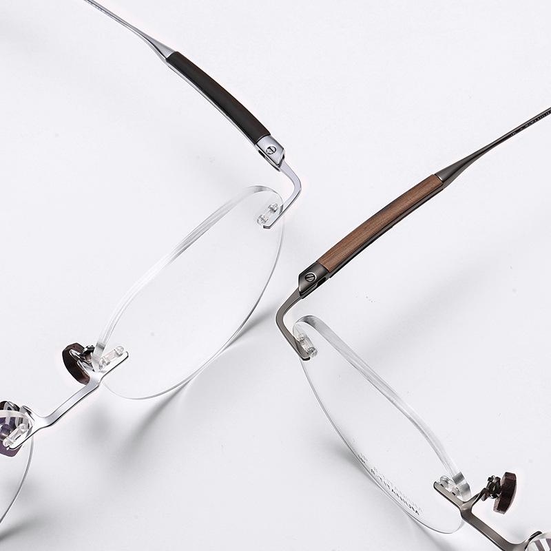 2025 Randlose Retro Sandelholzbrillen: Damen Leichter Luxus ohne Sehstärke, Blaulichtfilter mit Business-Herrenstil.