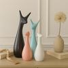 Home Decor Lucky Deer Family Matte Finish Ceramic Figures- (Set of 4, Sky, Brown, Pink, Off-White)