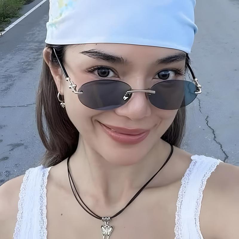 New Fashionable Frameless Cutting Edge Women'S Sunglasses Retro Neutral Elliptical Frame Uv400 Sunscreen Sunglasses