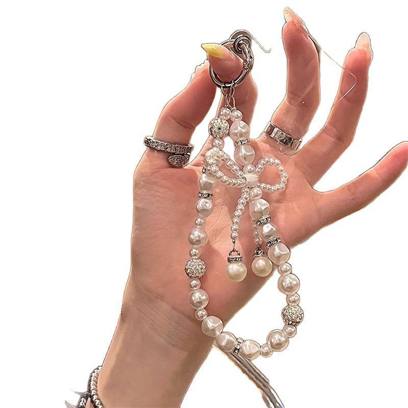 Neue Diamantbesetzte Perlen-Schleife Handy-Kette Schlüsselanhänger Anhänger Tasche Anti-Fall-Kette Handgefertigter Perlen-Handy-Anhänger