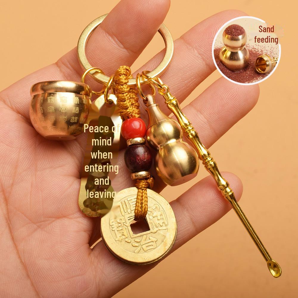 

Брелок-амулет: Монети п яти імператорів, гарбуз, абак, вежа Веньчан, мішок з грошима, Будда, совок, ложка для вух, кулон Мальовнича місцевість