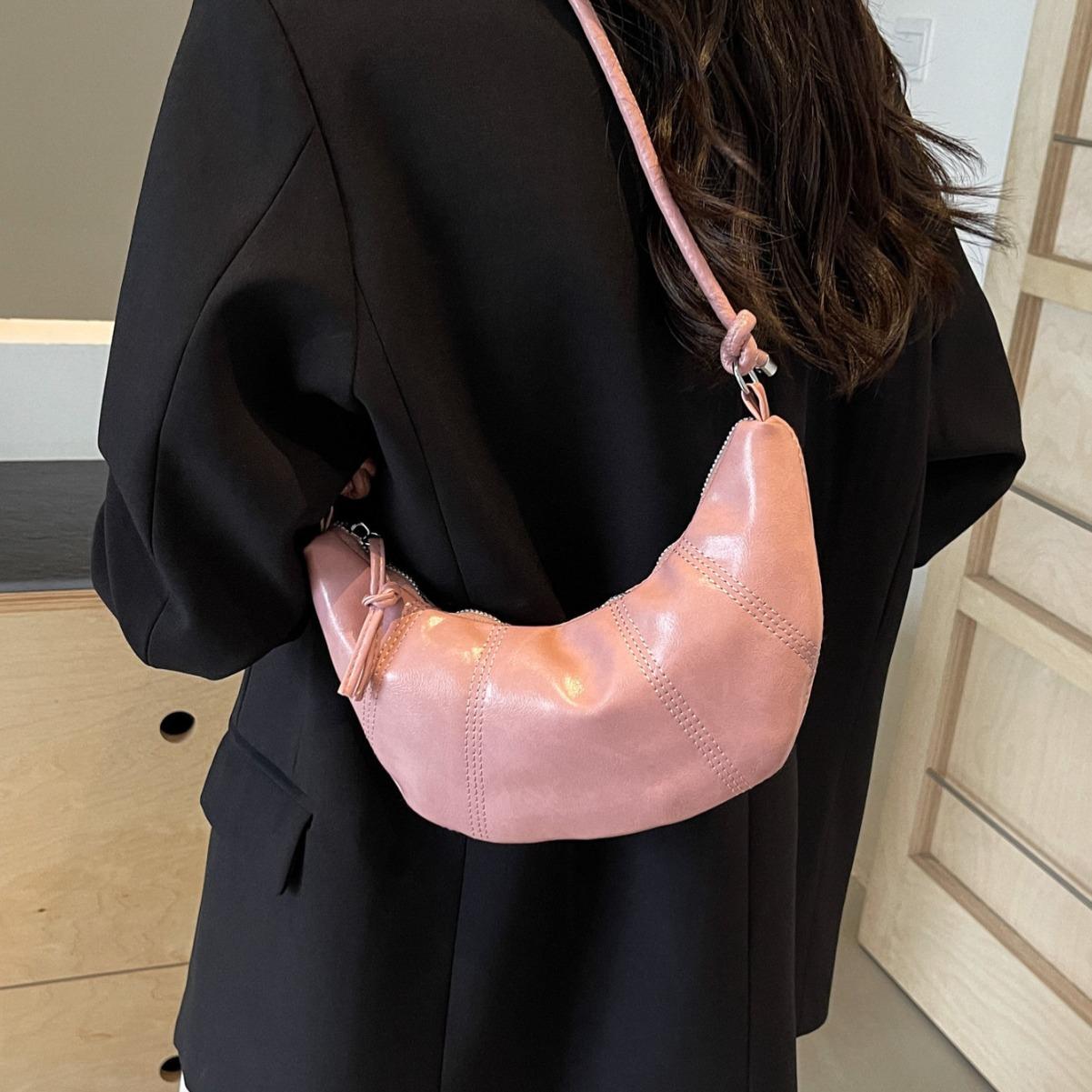 

Silver bag women 2025 new fashion design sense niche one shoulder crossbody dumpling bag popular croissant bag розовый