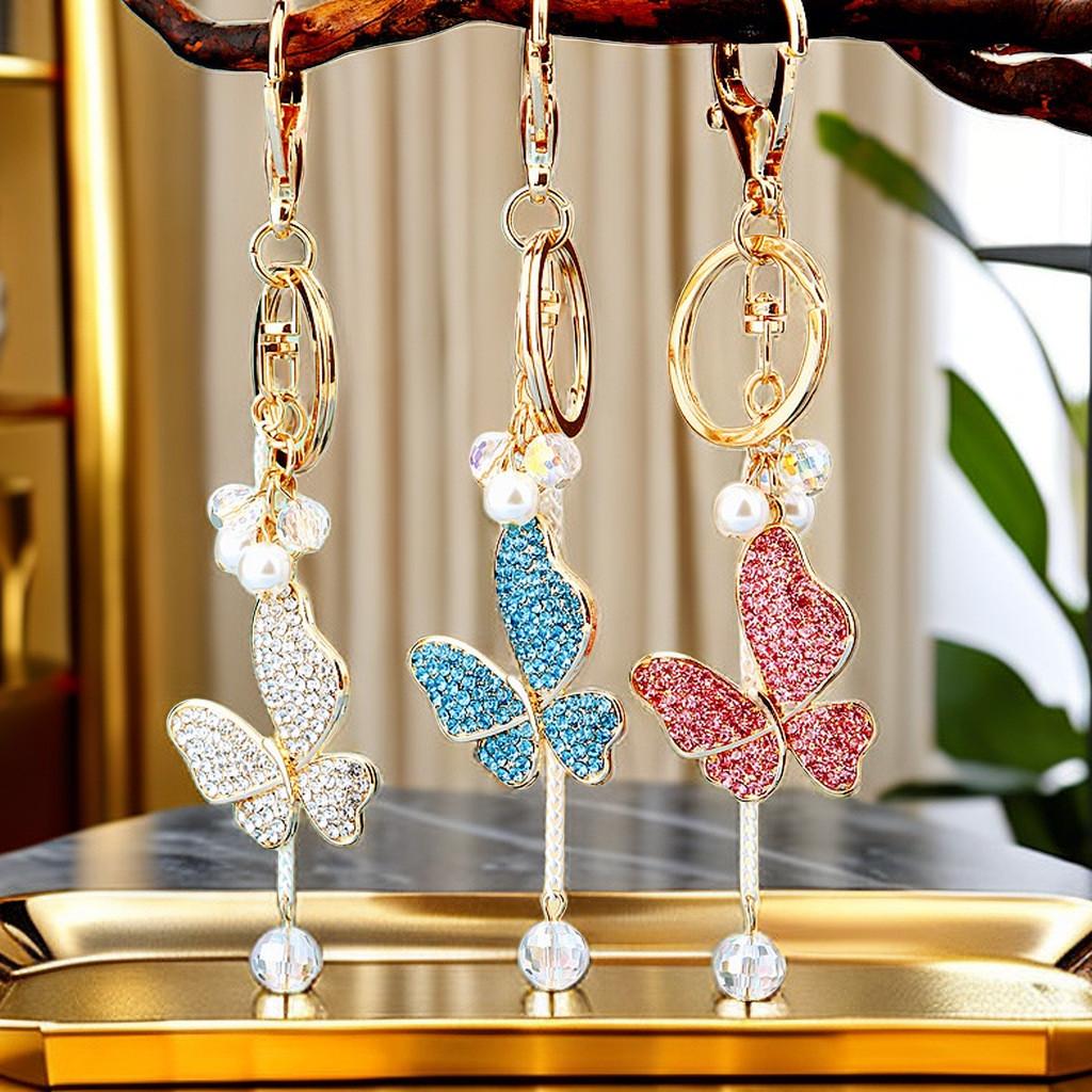 Cute Pearl Adorned Keychain With Vibrant Butterfly Design Ideal For Gift Giving Occasions