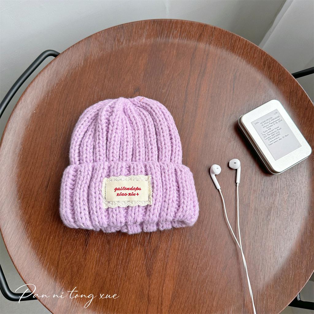 Neue Spitze Etikett Kinder Wollmütze Nuojiji Student Herbst und Winter Neu Warm und Vielseitig Ohrenschutz Strickmütze