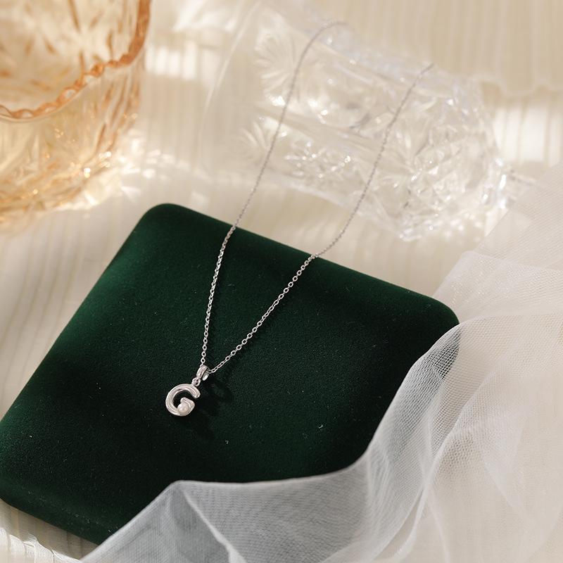 Banyan Tree S925 Silver Alphabet Pendant Necklace - Minimalist Clavicle Chain for Women, Fashionable and Versatile.