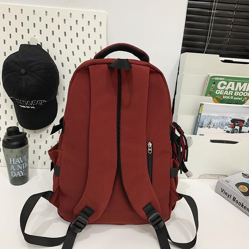 Ryggsäck för män i enfärgat utförande Ryggsäck för kvinnor med flera fickor Stor kapacitet Student Skolväska