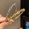 Gold-Plated Zirconia Horseshoe Buckle Bracelet - Chic, Versatile Luxury Accessory