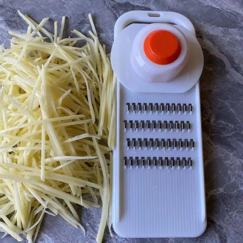 Restaurant-Grade Silk Grater & Julienne Slicer with Anti-Injury Device for Zucchini, Vegetables, and Taro