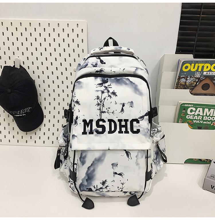 

Fashion schoolbag men s new simple contrasting colors junior high school backpack college student large capacity tie-dye backpack чорний