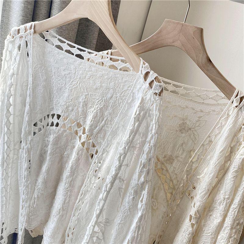 Evropský a americký letní krajkový háčkovaný kardigan dámská plážová bunda proti slunci