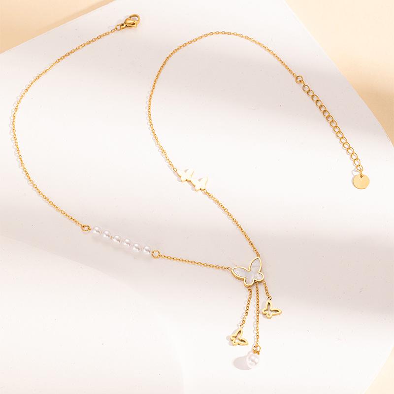 

Korean Butterfly Pearl Necklace: Summer Hollow Tassel Titanium Clavicle Chain for Women
