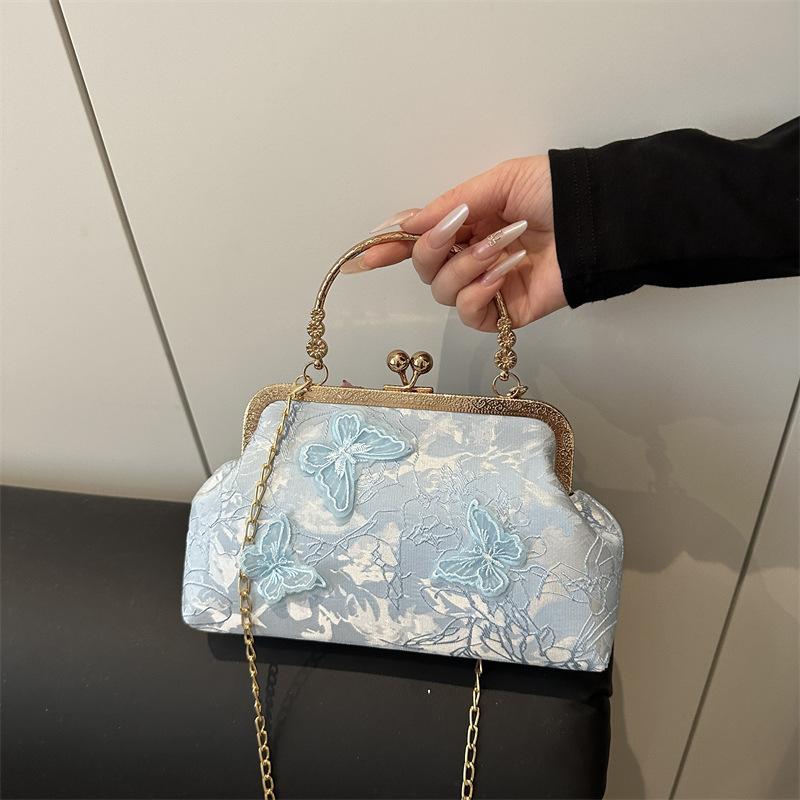 New trend simple casual shoulder portable fashion chain niche 2025 spring crossbody shell women's bag