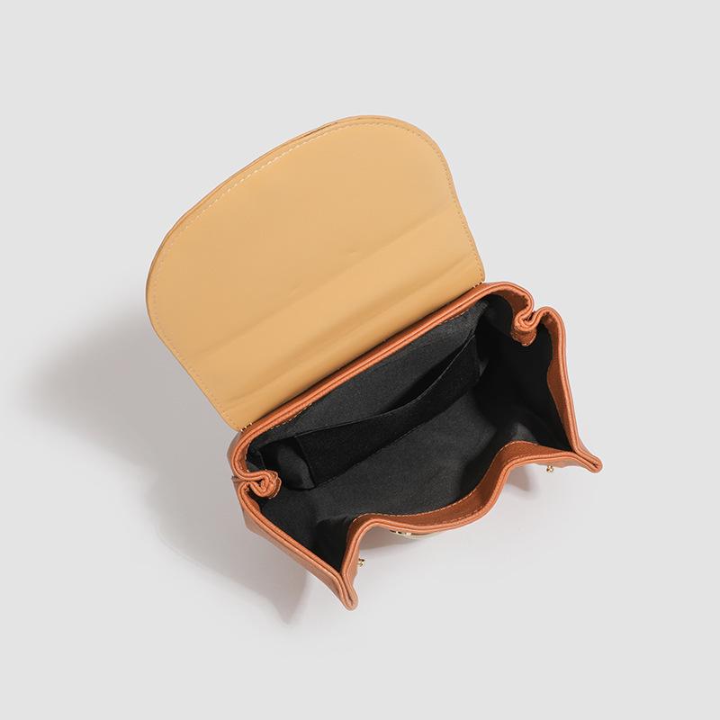 Ta damska torba niszowa, wysokiej klasy z uśmiechniętą buźką, jest modna i swobodna, i jest to torba do noszenia w ręku lub na ramię.