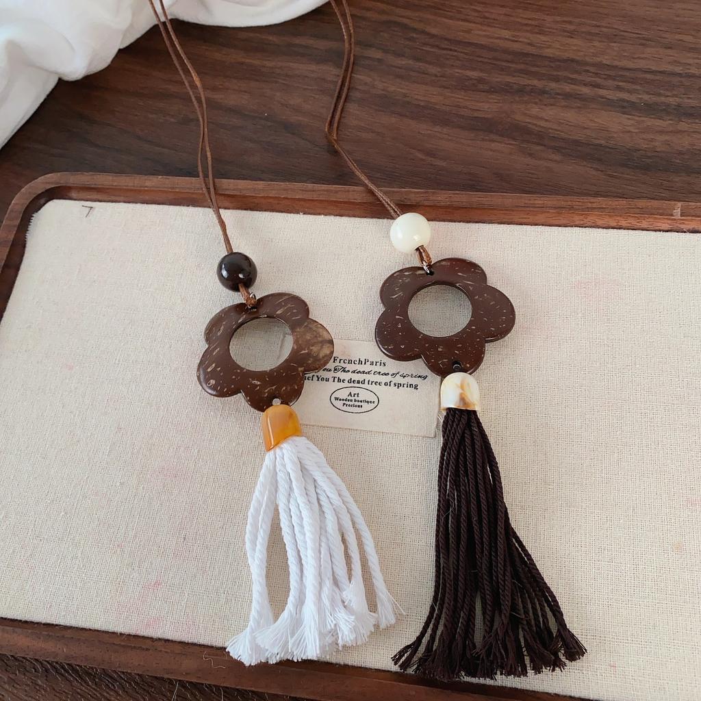 Wood hollow flower fringed necklace retro ethnic style long sweater chain 1111 new niche design items