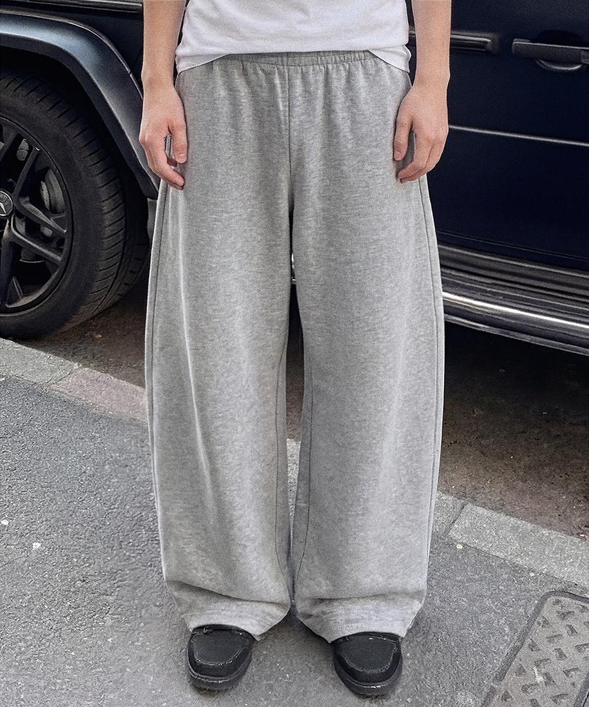 Eoneolleokodeu Curved Sweatpants (2 Colors)