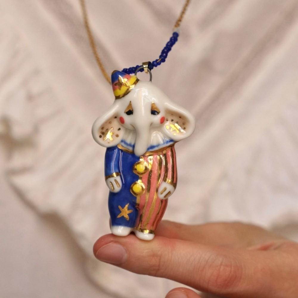 Vintage-Schlüsselbeinkette mit Cartoon-Zirkustiermotiven, verspielt und lässig