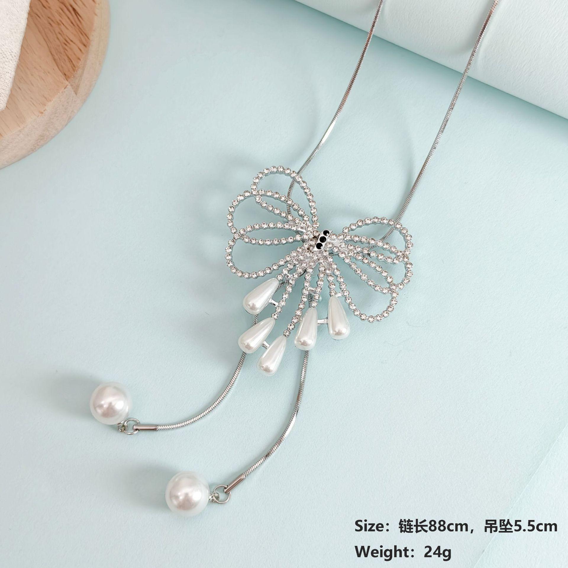 

Bow simple sweater chain pearl pendant long necklace niche versatile snake bone chain clothes accessories