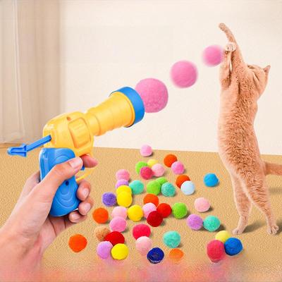 Elastic Cat Toy - Fluff Ball Launcher Gun for Boredom Relief & Interactive Play. High-quality, Bite-resistant Teaser Stick for Cats.