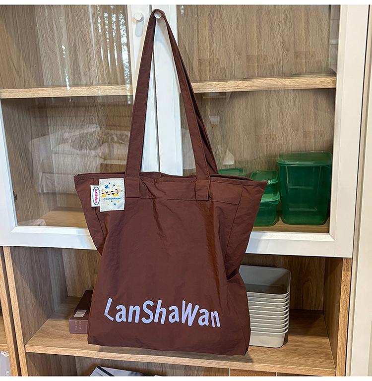 

Colored high-end nylon bag 2025 new simple and versatile large-capacity tote bag women s hand bag