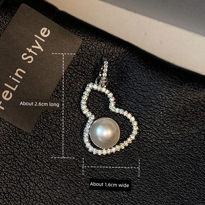 

Подарок на День матери для мамы Жемчужное ожерелье-подвеска Тыква Легкий Роскошный Меньшинство Причудливое Украшение 2025 Новый продукт Pendant