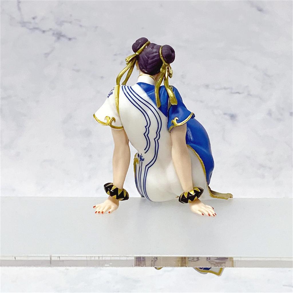 Street Fighter Chun Li PVC Statue with Classic Bun Hair Style and Sitting Pose for Gaming Room Decoration