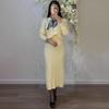 Autumn 2025 Women's European & American Fashion: Lapel Knit Sweater & Slimming Long Skirt Set