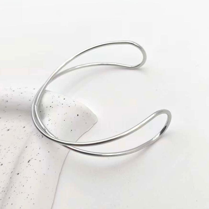 Элегантный женский роскошный браслет с геометрическим ажуром в две линии серебряный