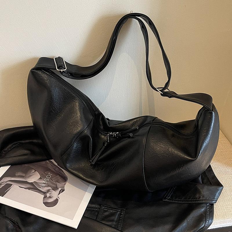 

Большая вместительная сумка женская осень и зима 2024 новая ретро сумка через плечо нишевая текстура женская взрывная сумка-пельмень чёрный