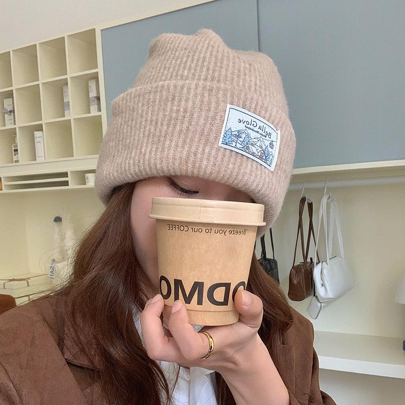 Solid color knitted wool hat women's autumn and winter face small retro sticker bag head warm cold ear protection cold hat