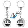 Heart-Shaped Rotating Piano Key Pendant Keychain with Gem and Musical Notes Ornament
