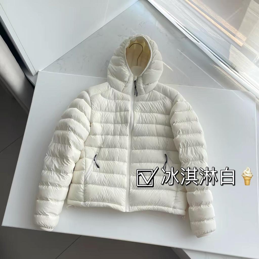 New autumn and winter high-end white duck down light and short hooded ribs down jacket women's jacket tide