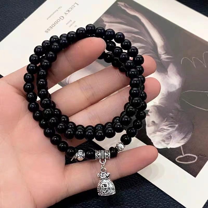 Sophisticated Black Beaded Bracelet For Women With Unique Design Elements
