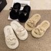 Foreign trade autumn and winter niche design sense Korean version flat-bottomed versatile fluffy slippers women's bow casual one-word cotton slippers