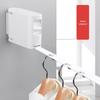Windproof Retractable Indoor Clothesline with Holes - Invisible Wall-Mounted Drying Rack, No Punching Needed.
