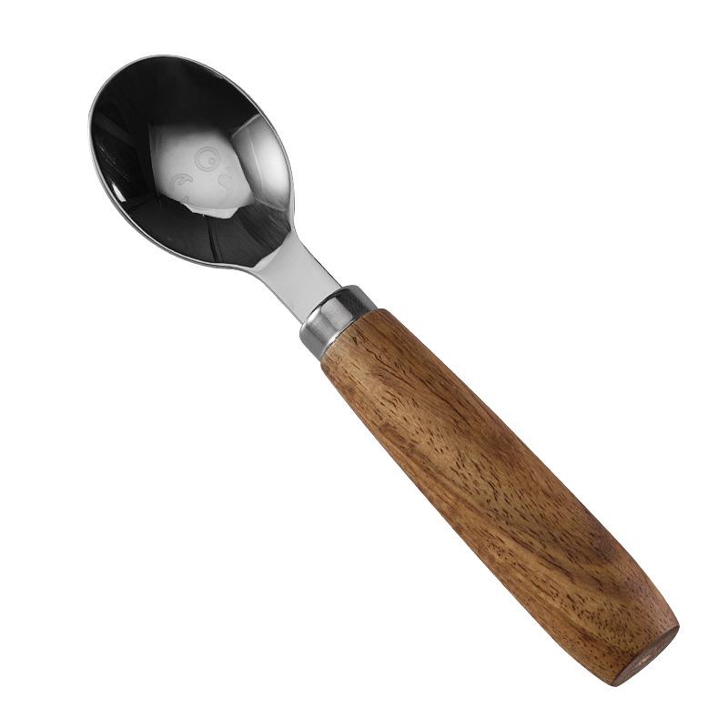 

Набор столовых приборов «Улыбка»: Ложка из нержавеющей стали, вилка, нож для сыра, нож для стейка и нож для масла с ручками из грушевого дерева.