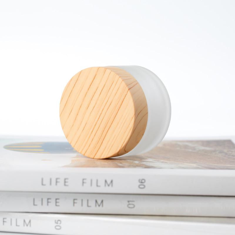Flacon de voyage crème et lotion cosmétique en verre dépoli à grain de bois