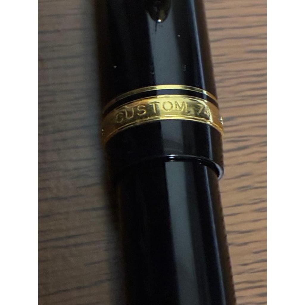 Used PILOT ballpoint pen, black, gold clip